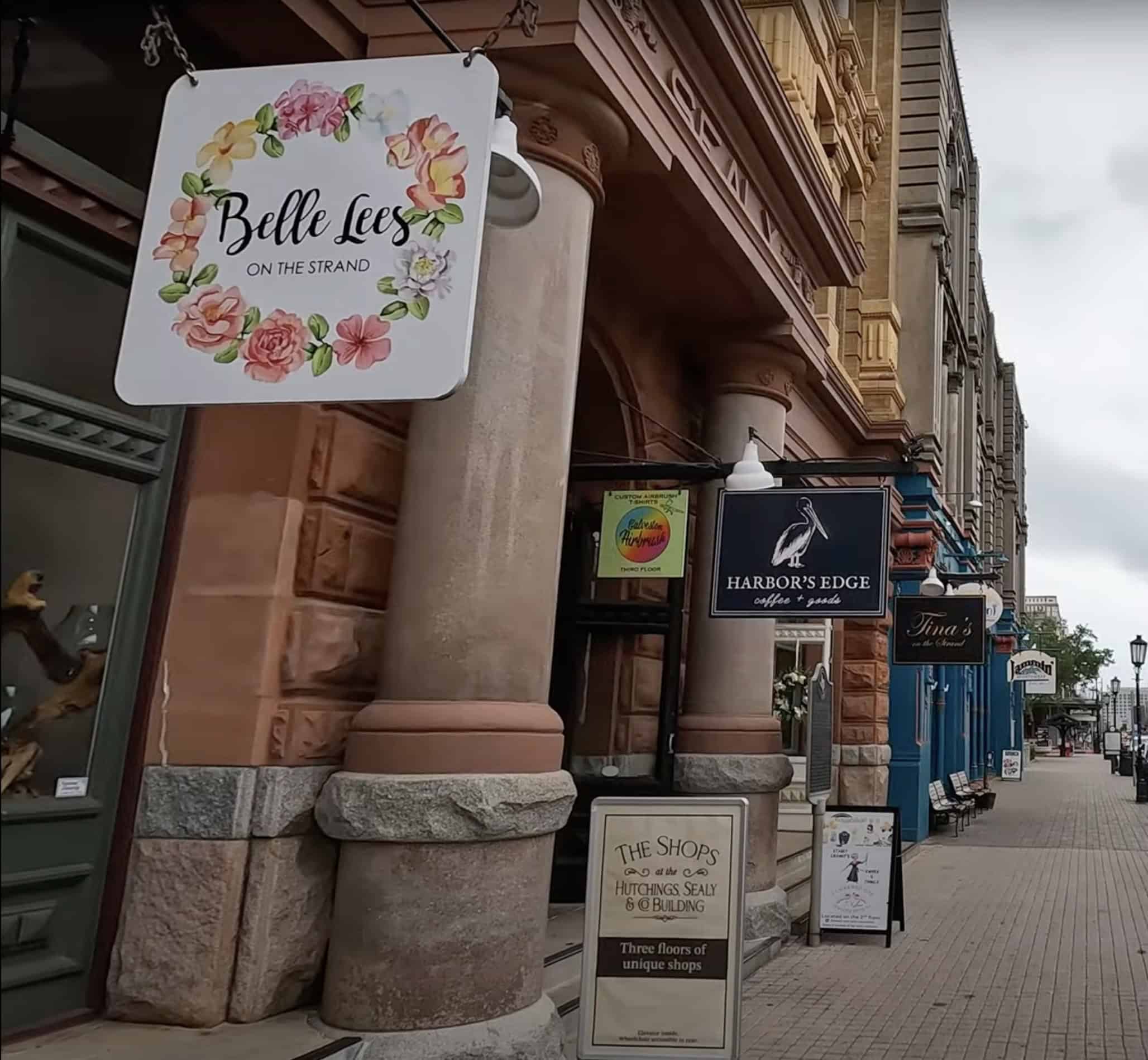 Shops and boutiques along The Strand in historic downtown Galveston, Texas, featuring Belle Lees, Harbor’s Edge, and other local favorites — a must-visit shopping destination for cruise passengers and tourists.