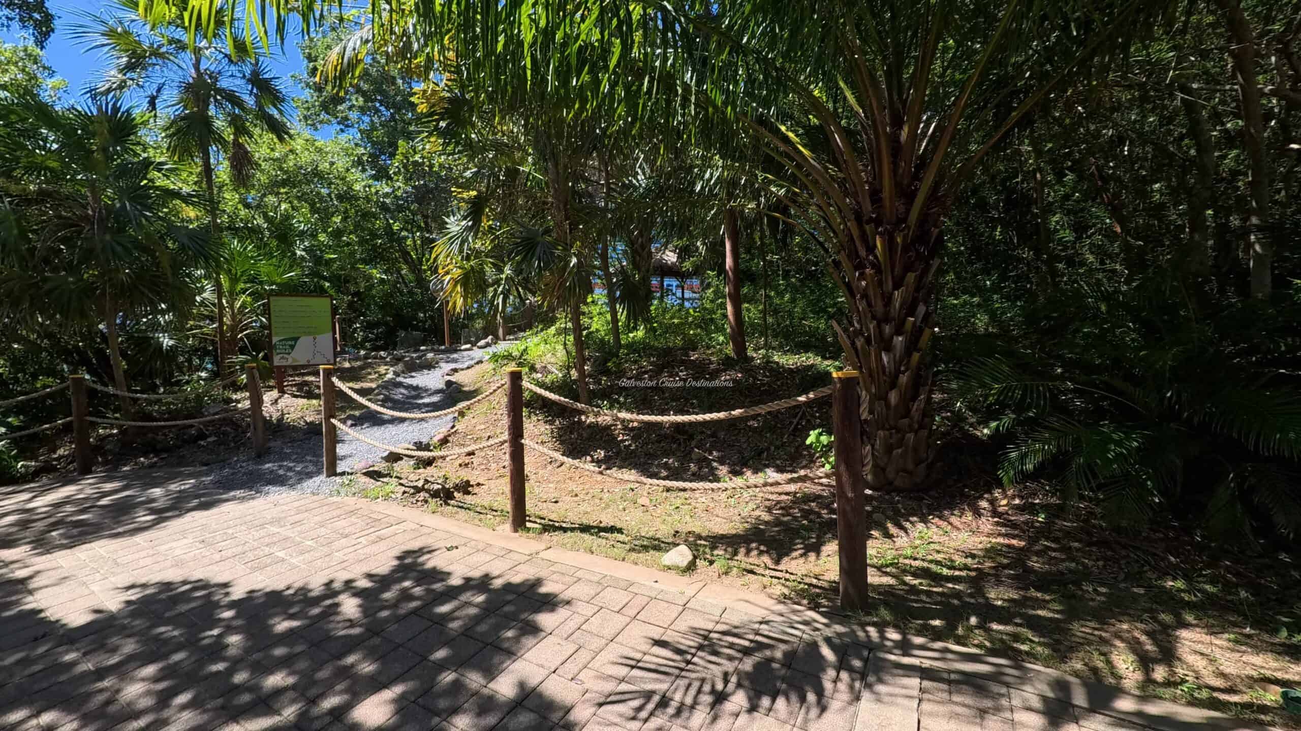 Isla Tropicale Mahogany Bay Nature Trail Entrance Paved Path Roatan Honduras Galveston Cruise Destinations