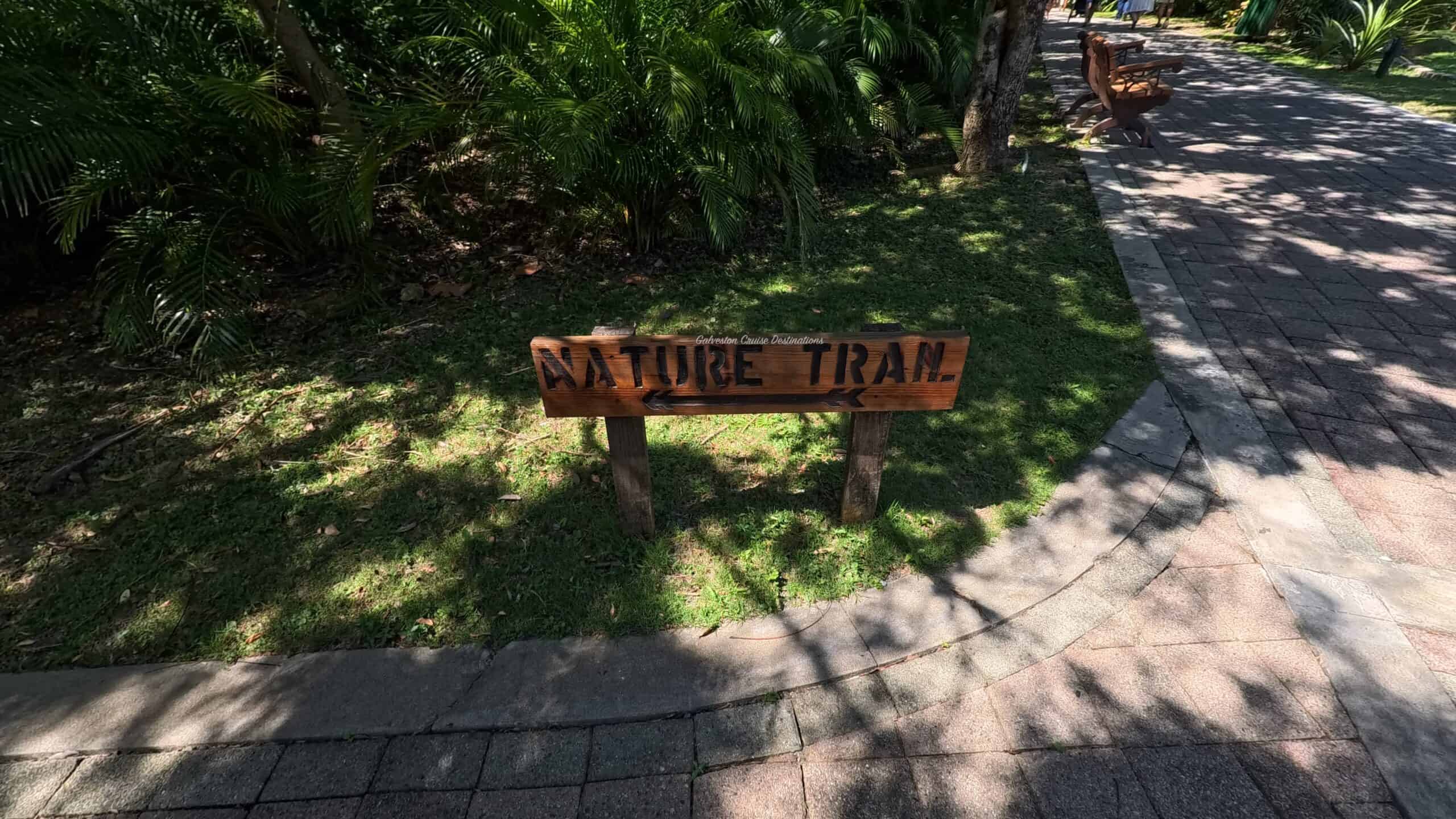 Isla Tropicale Mahogany Bay Nature Trail Sign and Rest Bench Roatan Honduras Galveston Cruise Destinations